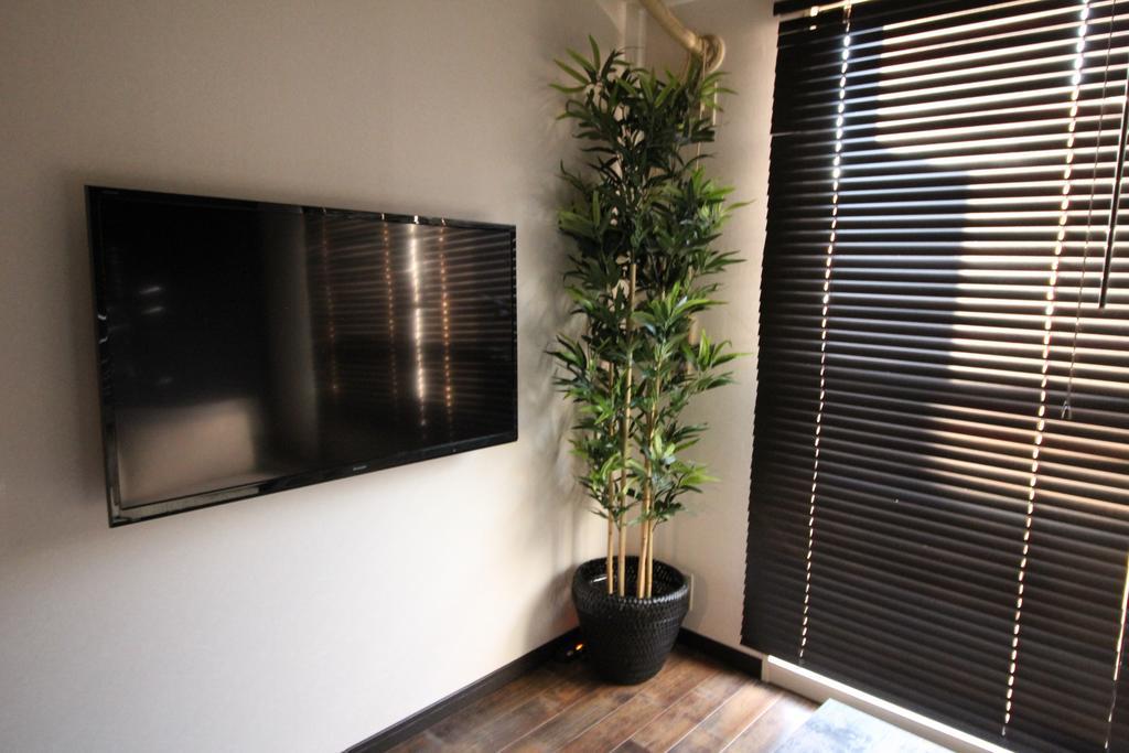Ookini Hotels Karasuma Gojo Apartment كيوتو الغرفة الصورة