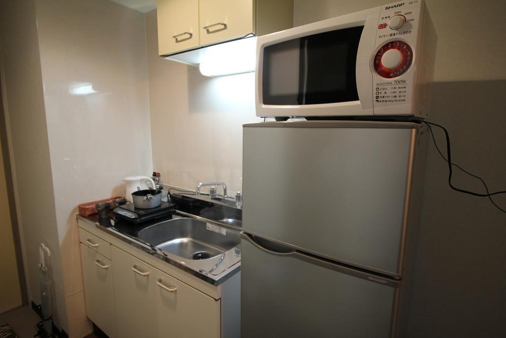 Ookini Hotels Karasuma Gojo Apartment كيوتو الغرفة الصورة